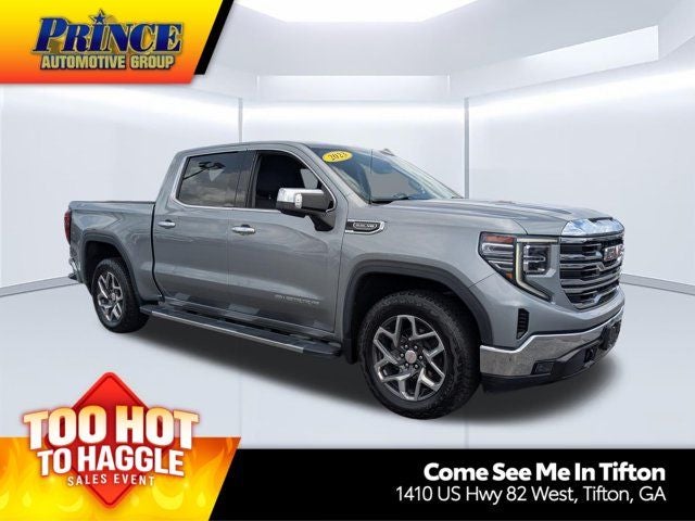 2023 GMC Sierra 1500 SLT in Sterling Metallic — front three-quarter view