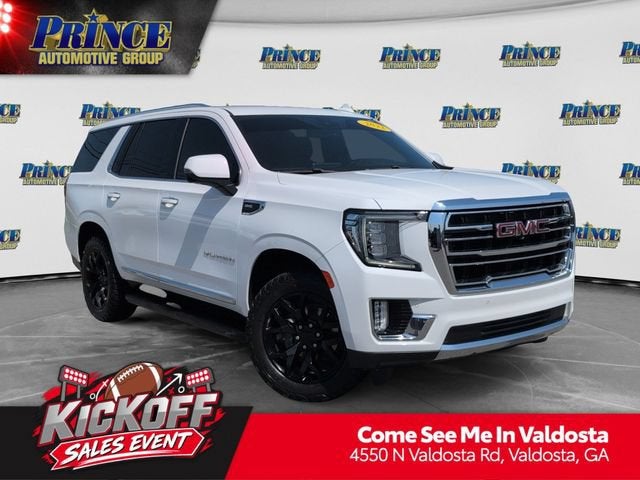 2022 GMC Yukon SLT in Summit White — front three-quarter view