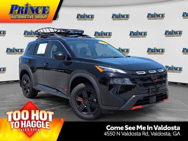 2025 Nissan Rogue Rock Creek in Black — front three-quarter view